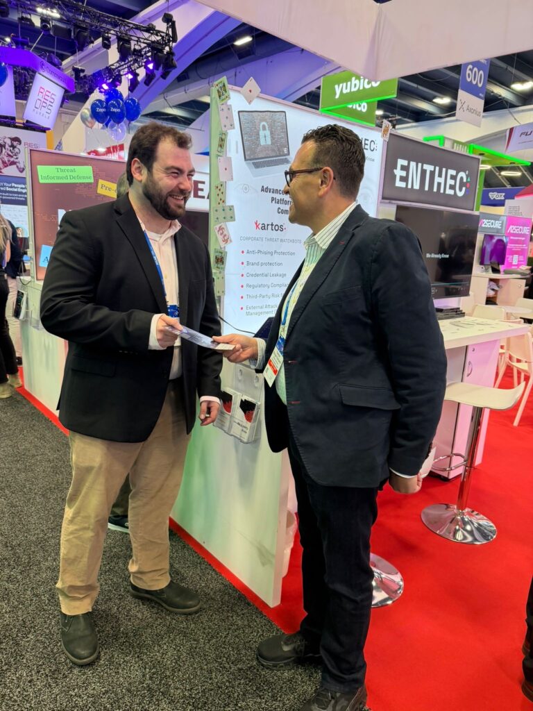 Visitors at the RSAC26 stand